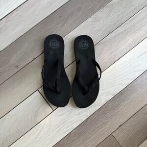 Reef ginger black flip flop